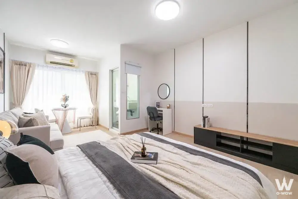 Bright 1-bed condo for sale in A Space Sukhumvit 77 featuring light wood floors and a modern open-plan layout