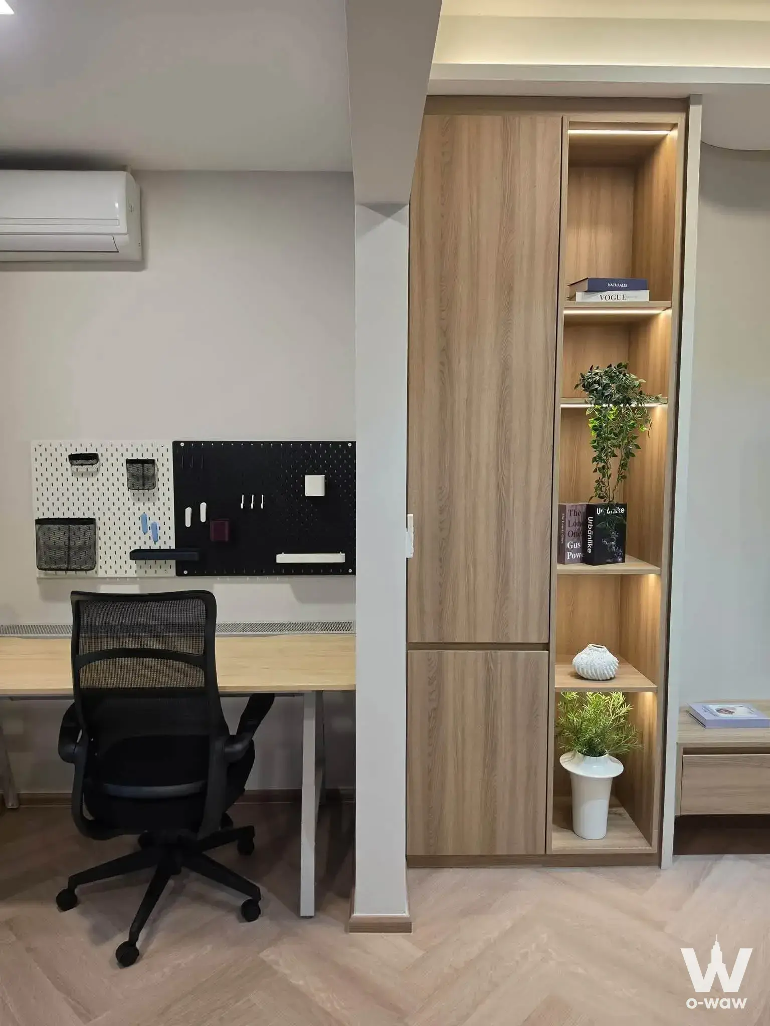 3-bed townhouse for rent in VIVE Bangna KM.7 home office with light-wood desk, pegboard organizer, and built-in cabinet