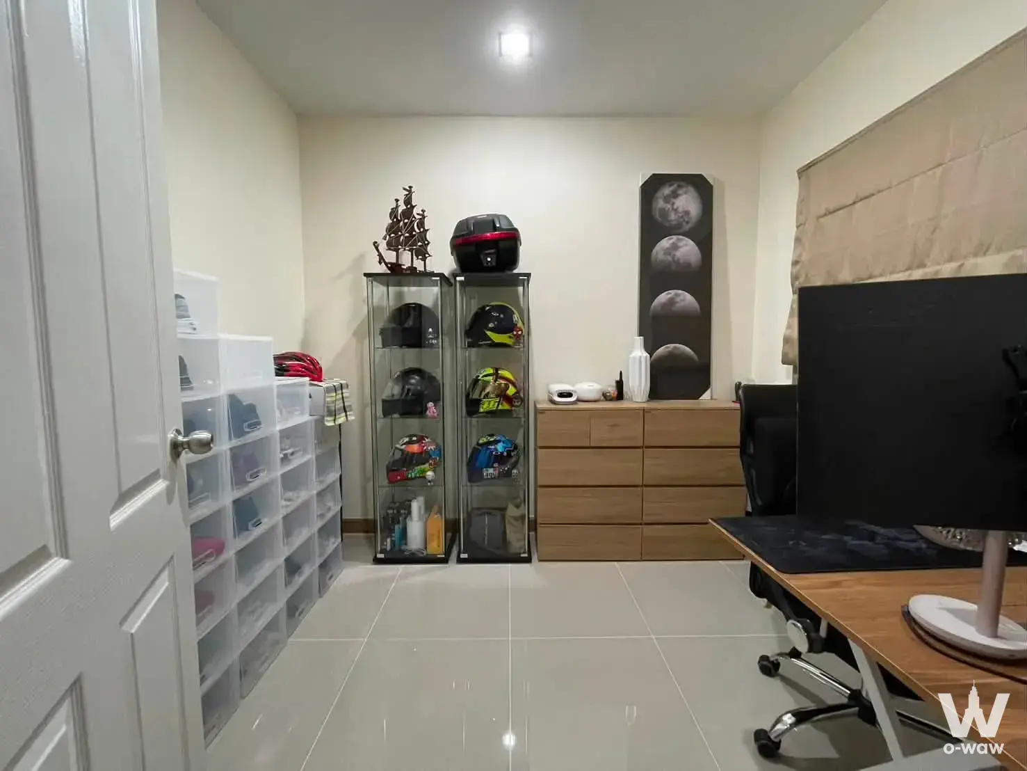 Home office in Golden Town 3 Bangna-Suanluang townhouse with motorcycle helmet display cabinets