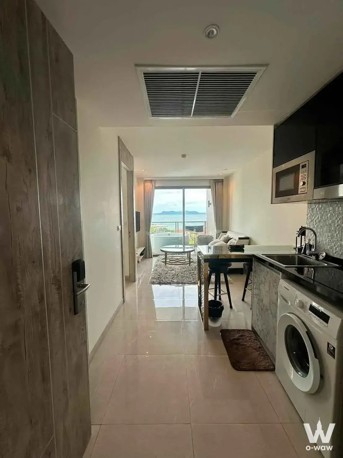 1-bed condo in The Riviera Monaco with ocean view, modern kitchen, and balcony bathtub