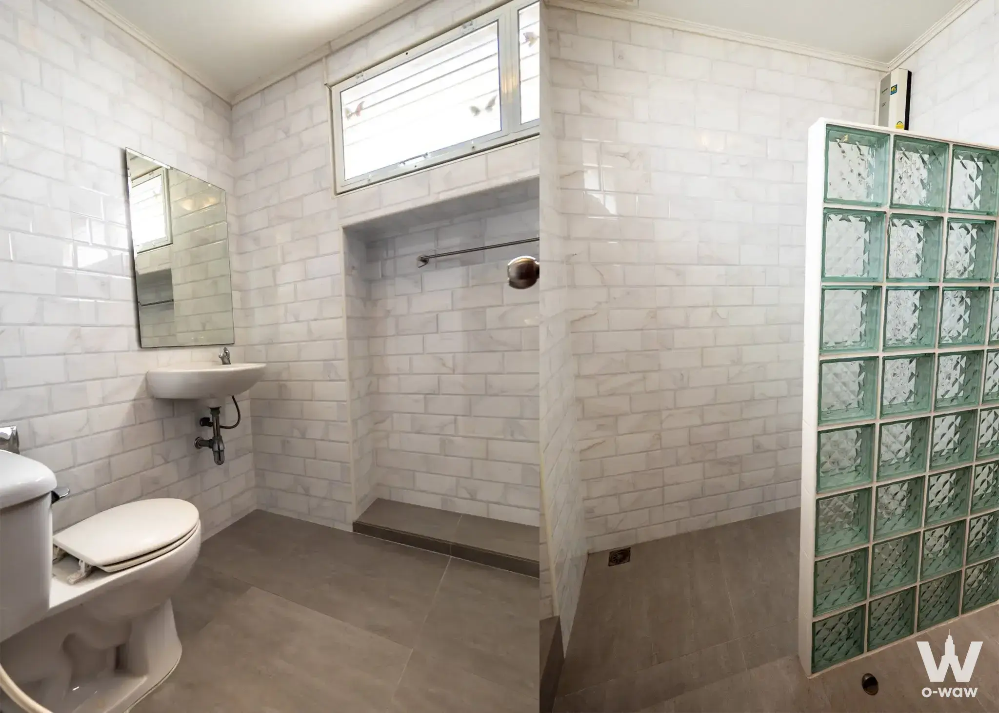 Modern bathroom with green glass block partition and subway tiles in a 5-bed Ekkamai Villa townhouse