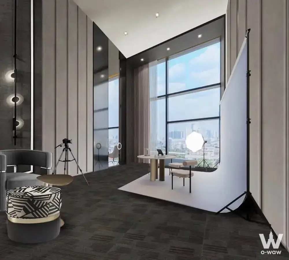 High-floor studio with city skyline view and photography equipment in a 1-bed condo for sale at Modiz Voyage Srinakarin