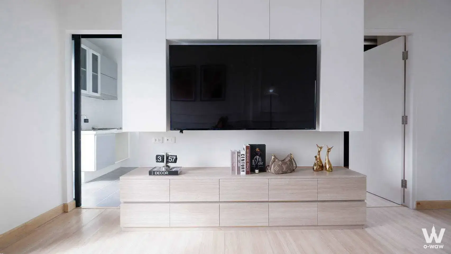 Minimalist living room in Niche Mono Ratchavipha with a recessed TV niche and light wood media console