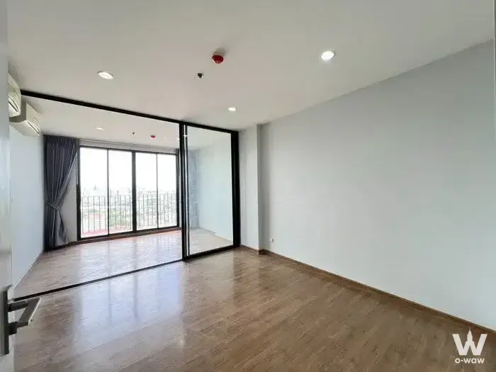 Unfurnished 1-bed condo for sale in The Tree Interchange with glossy tile floors and balcony access