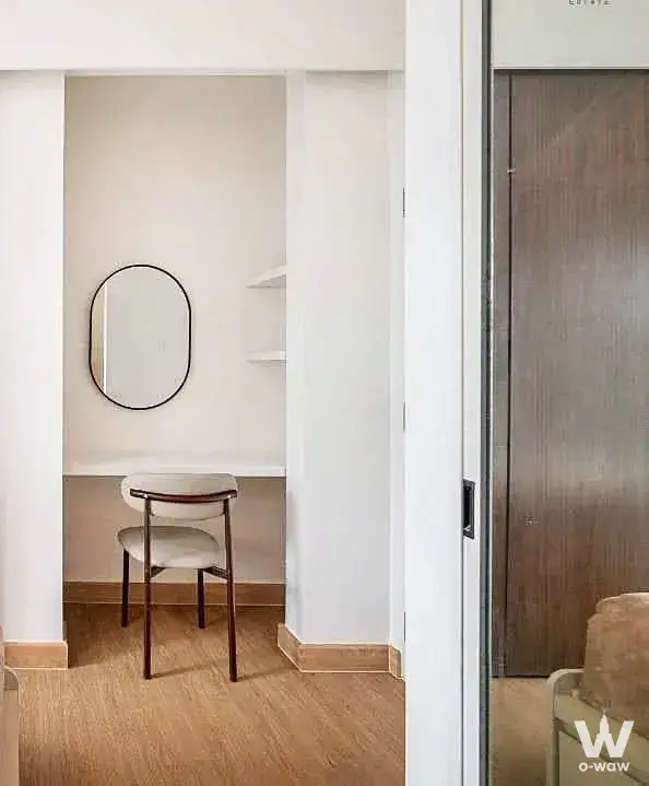 Bedroom vanity nook with built-in desk and mirror in a 1-bed condo for rent in A space Sukhumvit 77