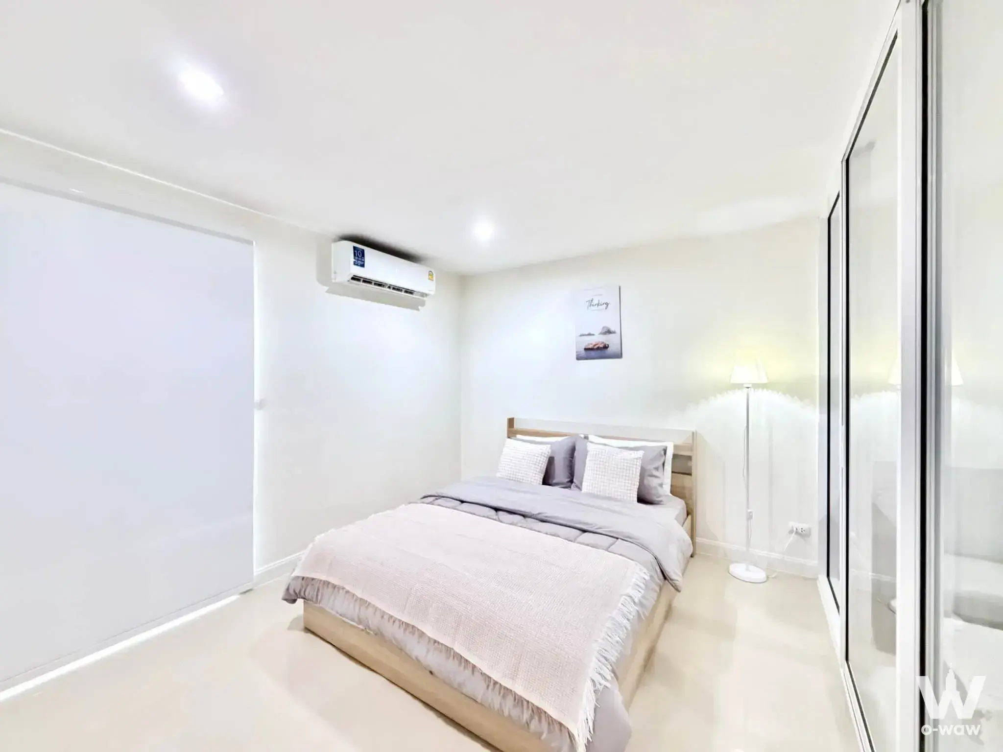 Bright modern bedroom for sale in Regent Home 22 featuring light wood frame and minimalist style