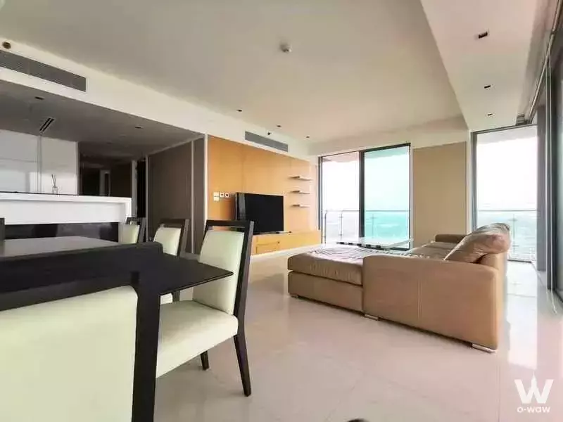 Spacious living area in 3-bed condo for rent at The Pano with ocean views and modern furniture