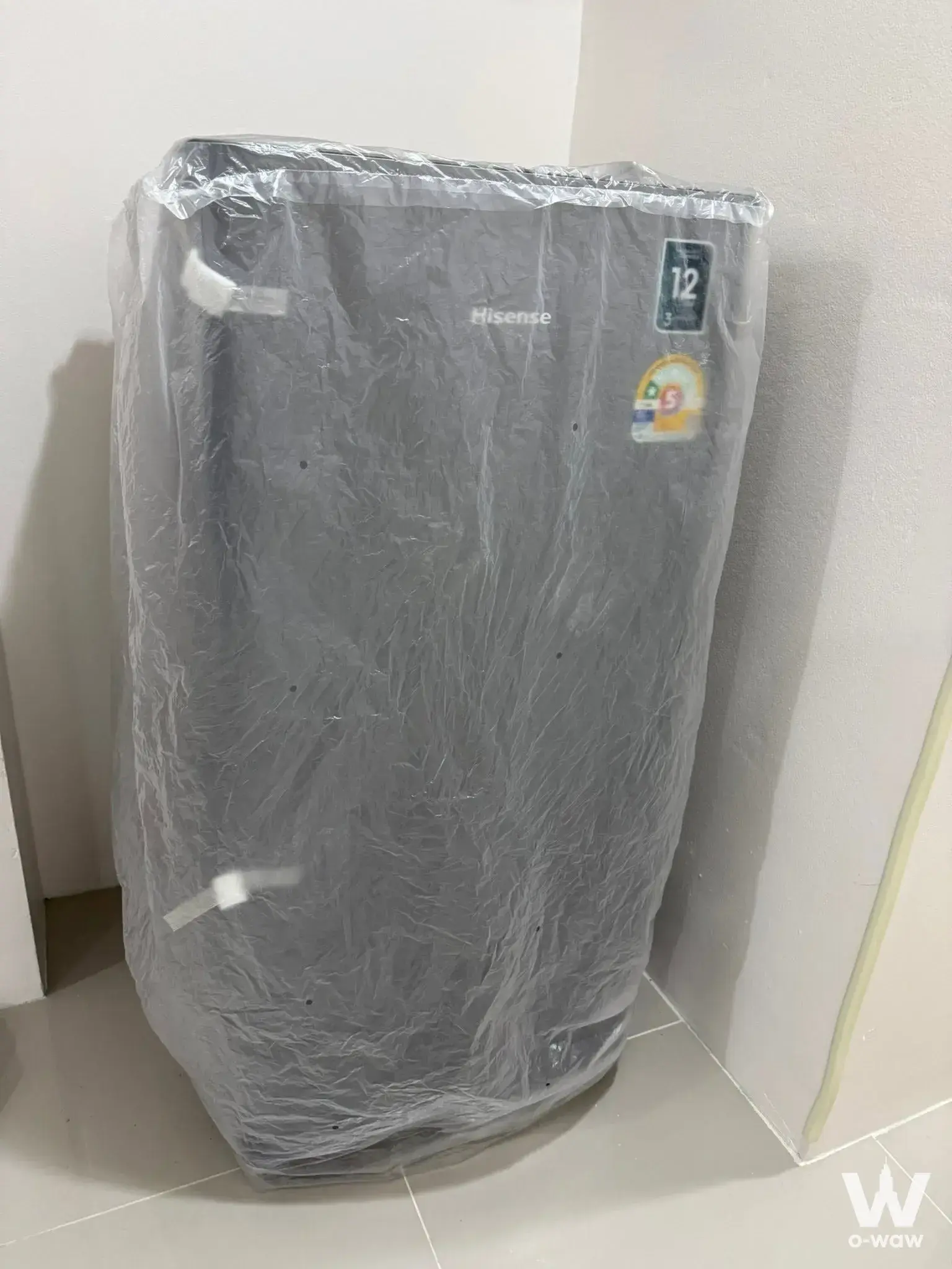 New Hisense washing machine in laundry nook of 1-bed condo for rent at The Kris 5 Ratchada 17