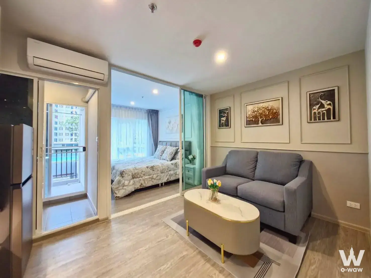 Bright 1-bed condo for rent in Regent Home Bangna with wood floors and balcony view