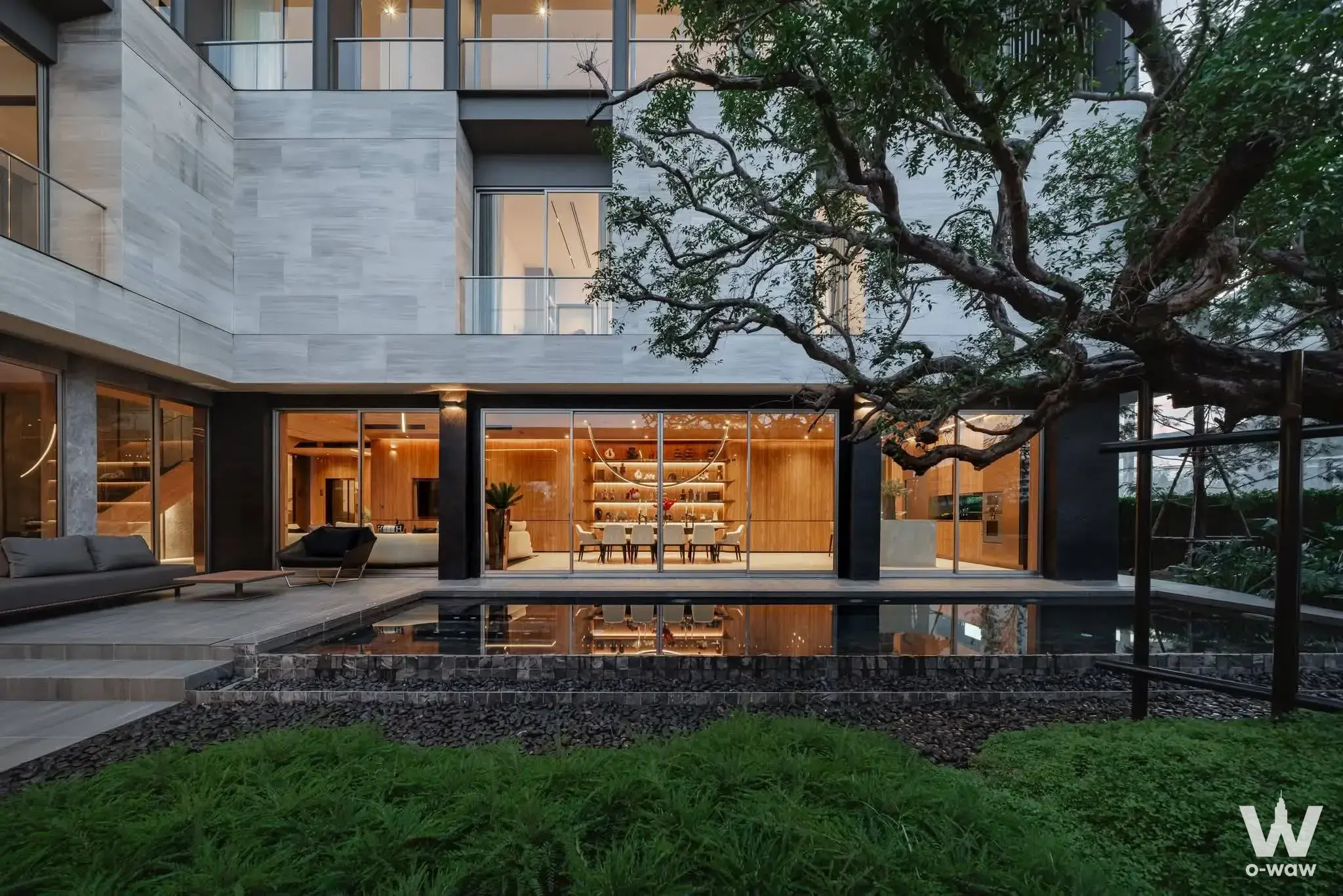 0-bed house for sale in Nirvana Collection Krungthep Kreetha featuring a reflecting pool and modern luxury villa exterior