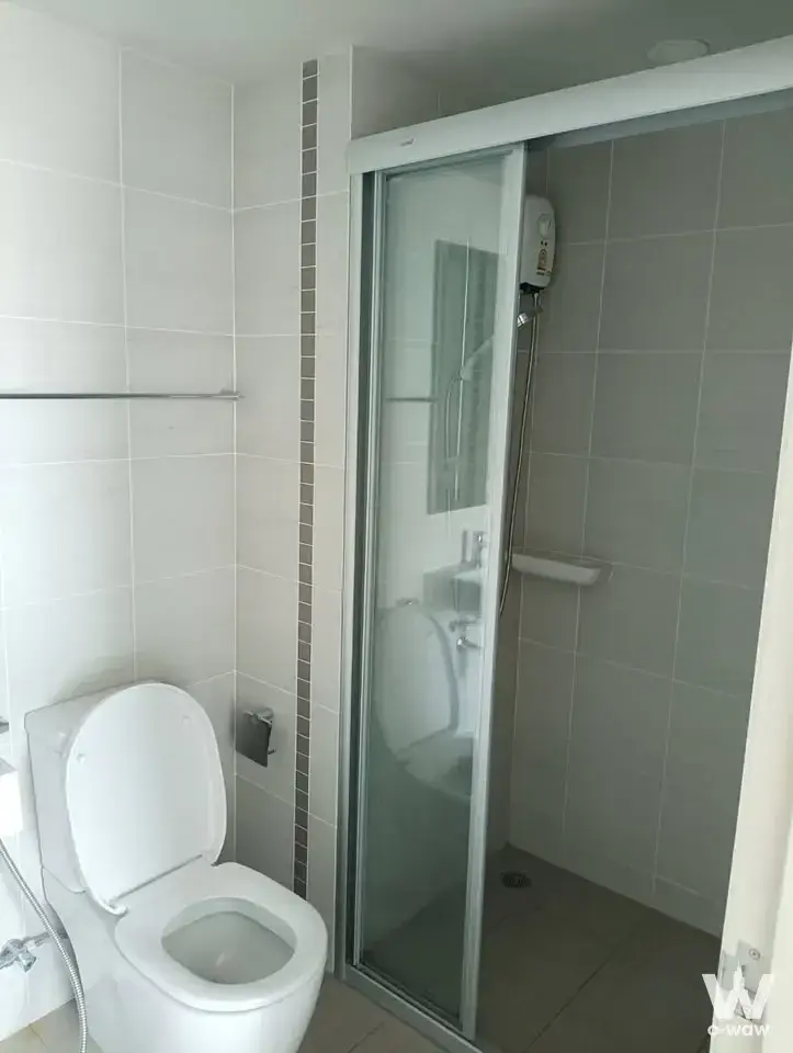 Compact bathroom in Lumpini Selected condo with white tiles, walk-in shower, and mosaic accents