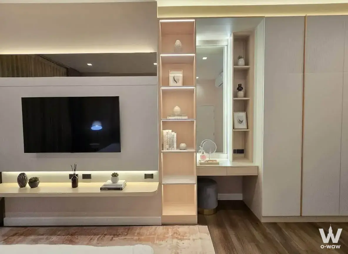 Modern bedroom with built-in LED-lit entertainment wall and vanity in Bangkok Boulevard Sathorn Pinklao 2 house