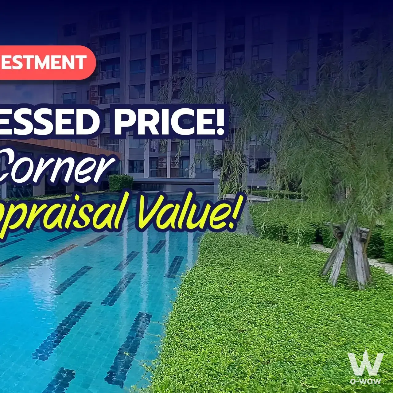 2-bed condo for sale in Life Pinklao outdoor swimming pool surrounded by lush greenery and modern building