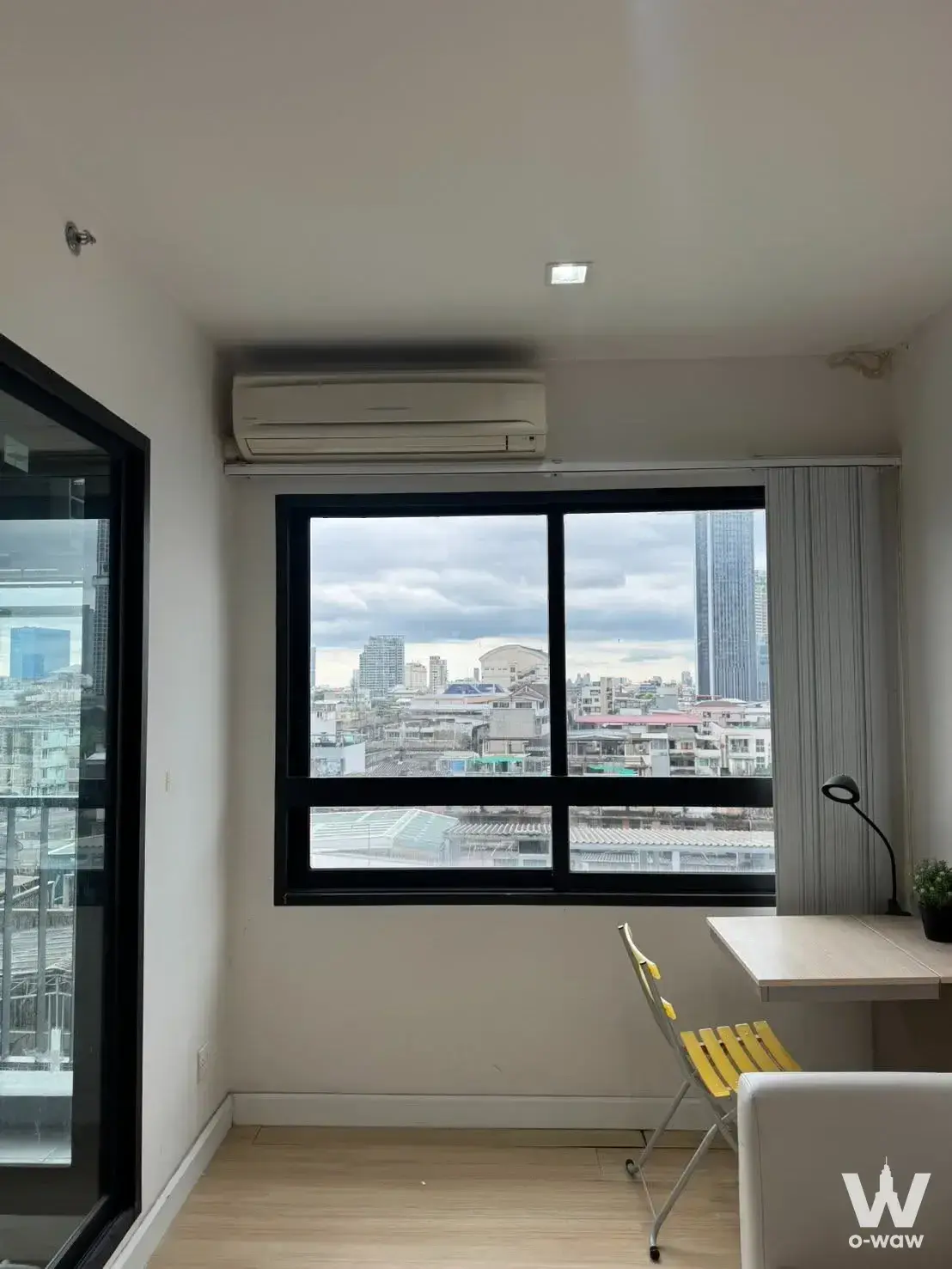 Modern 1-bed condo for rent in The Seed Mingle Suanplu with light wood floors and city view