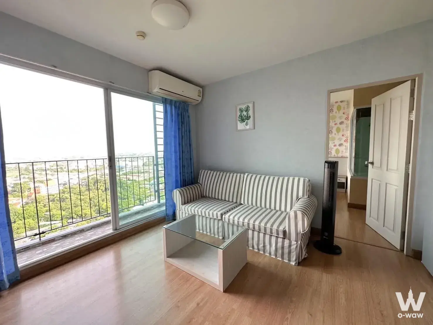 2-bed condo for rent in Chapter One Modern Dutch Rat Burana 33 with city view and striped sofa