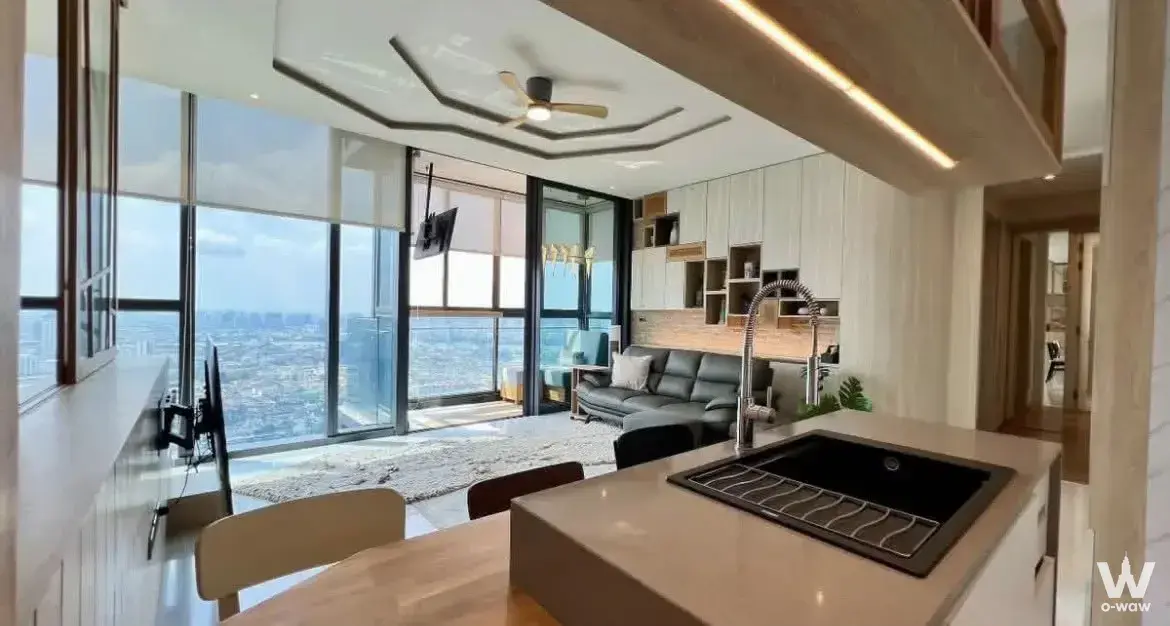 Living kitchen with city view in Canapaya Residences high-rise