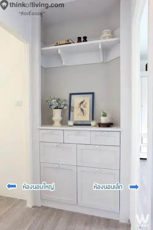 White built-in storage niche with decorative items in a 2-bed townhouse for sale in Indy 2 Bangna