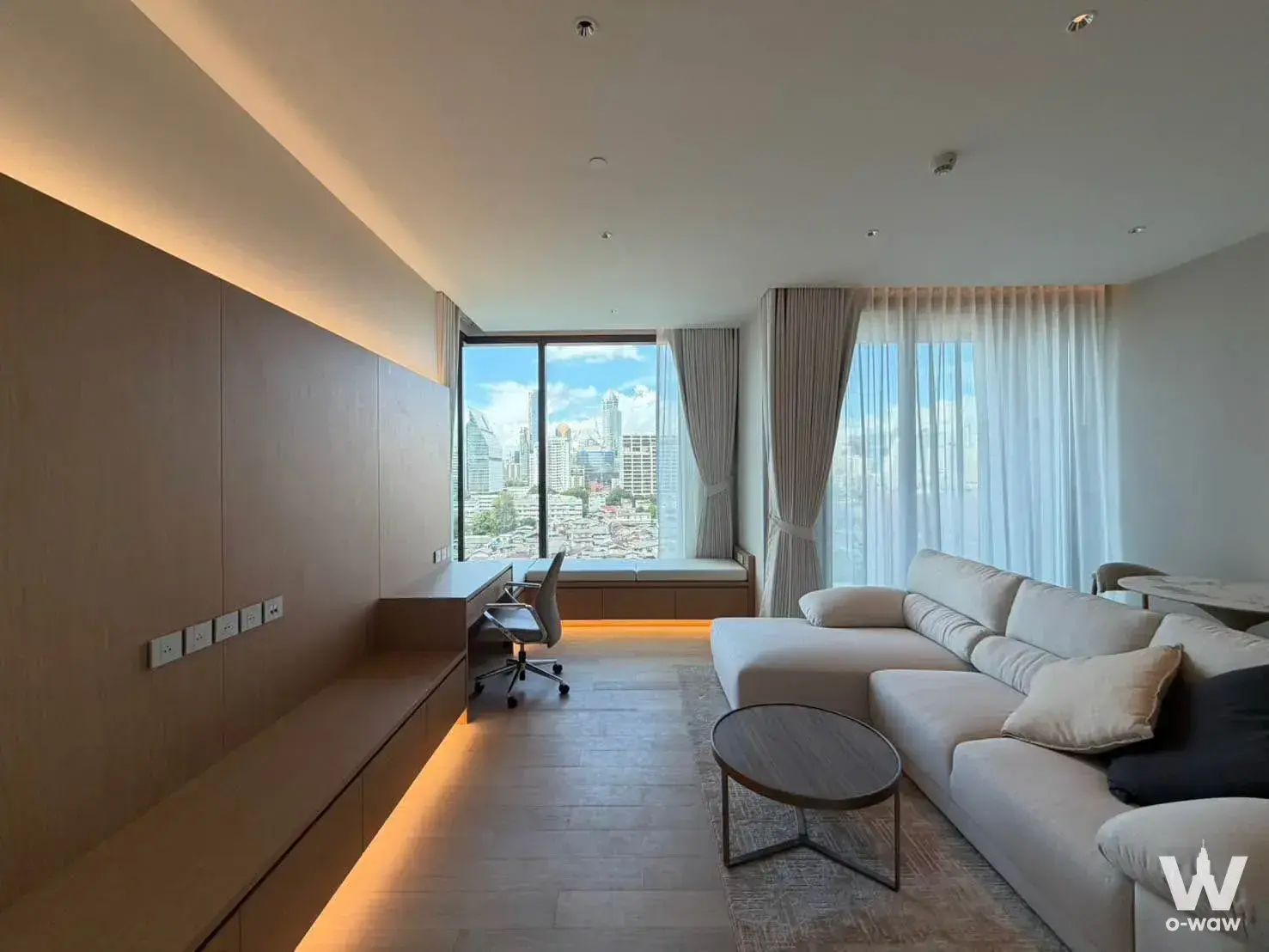 1-bed condo for rent in EI8HTEEN SEVEN with L-shaped sofa and city skyline view