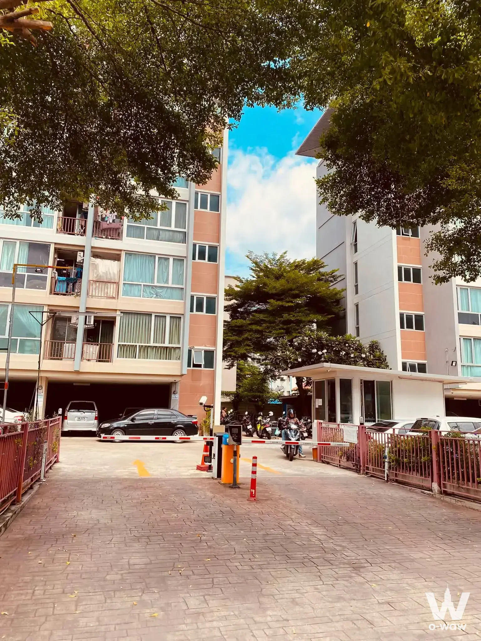 1-bed condo for sale in The Cube Ramkhamhang with terracotta facade, balconies and a parking garage