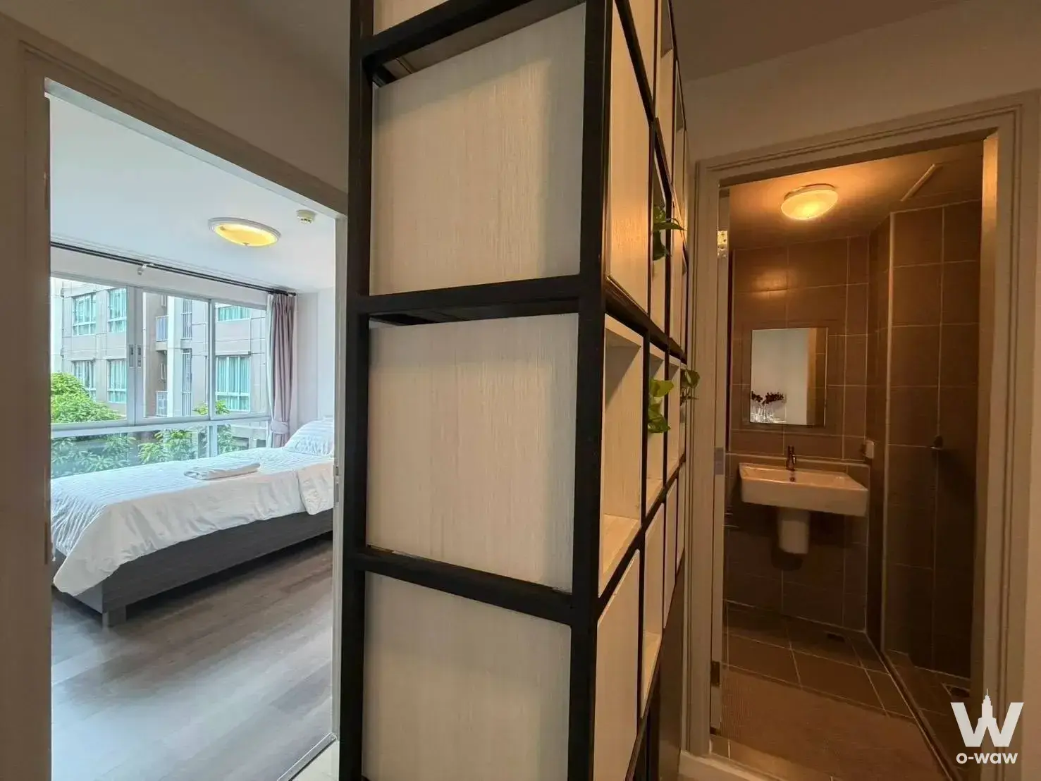 2-bed condo bedroom in dcondo Campus Resort Rangsit with ensuite bathroom and city view