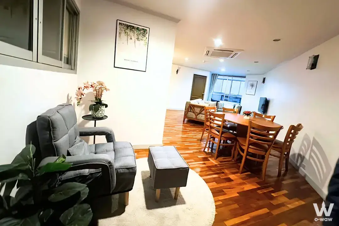 3-bed condo living room for sale in Tai Ping Towers featuring herringbone floors and city views