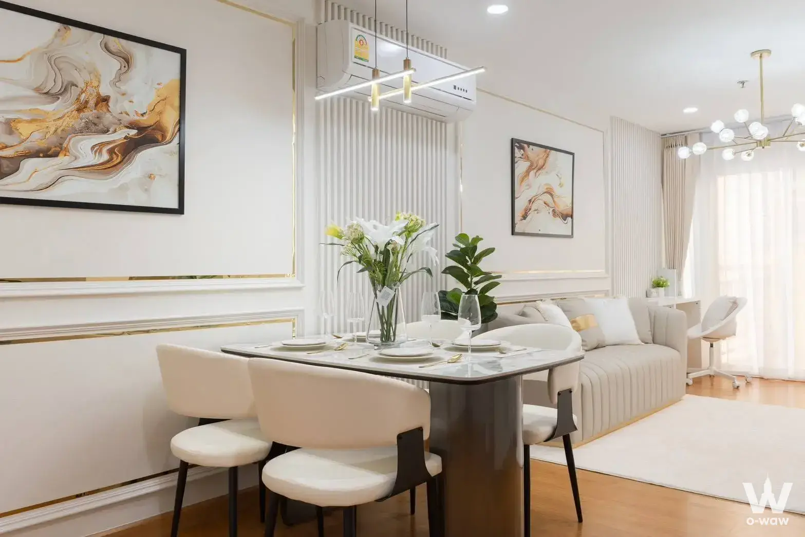 1-bed condo for sale in Le Rich Condo showcasing a dining area with marble table and gold pendant lighting