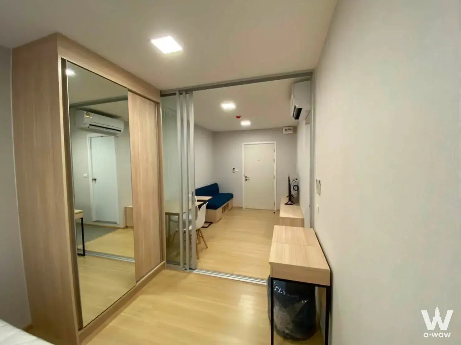 Furnished studio unit with wardrobe and glass partition in Plum Condo Rangsit Fresh