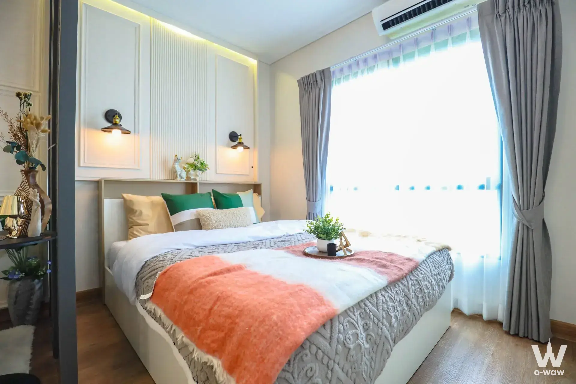 Modern bedroom with wainscoting and LED lighting in UNiO Rama2-Thakham 1-bed condo for sale