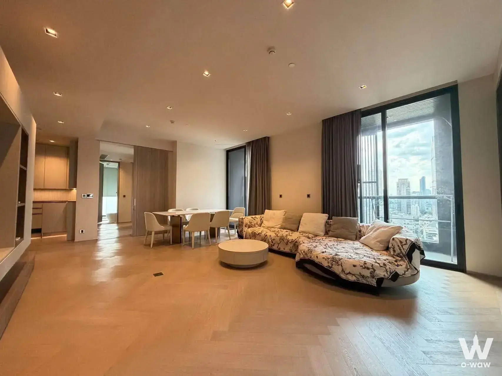 4-bed condo for sale in The Reserve Sathorn with herringbone floors and city skyline view
