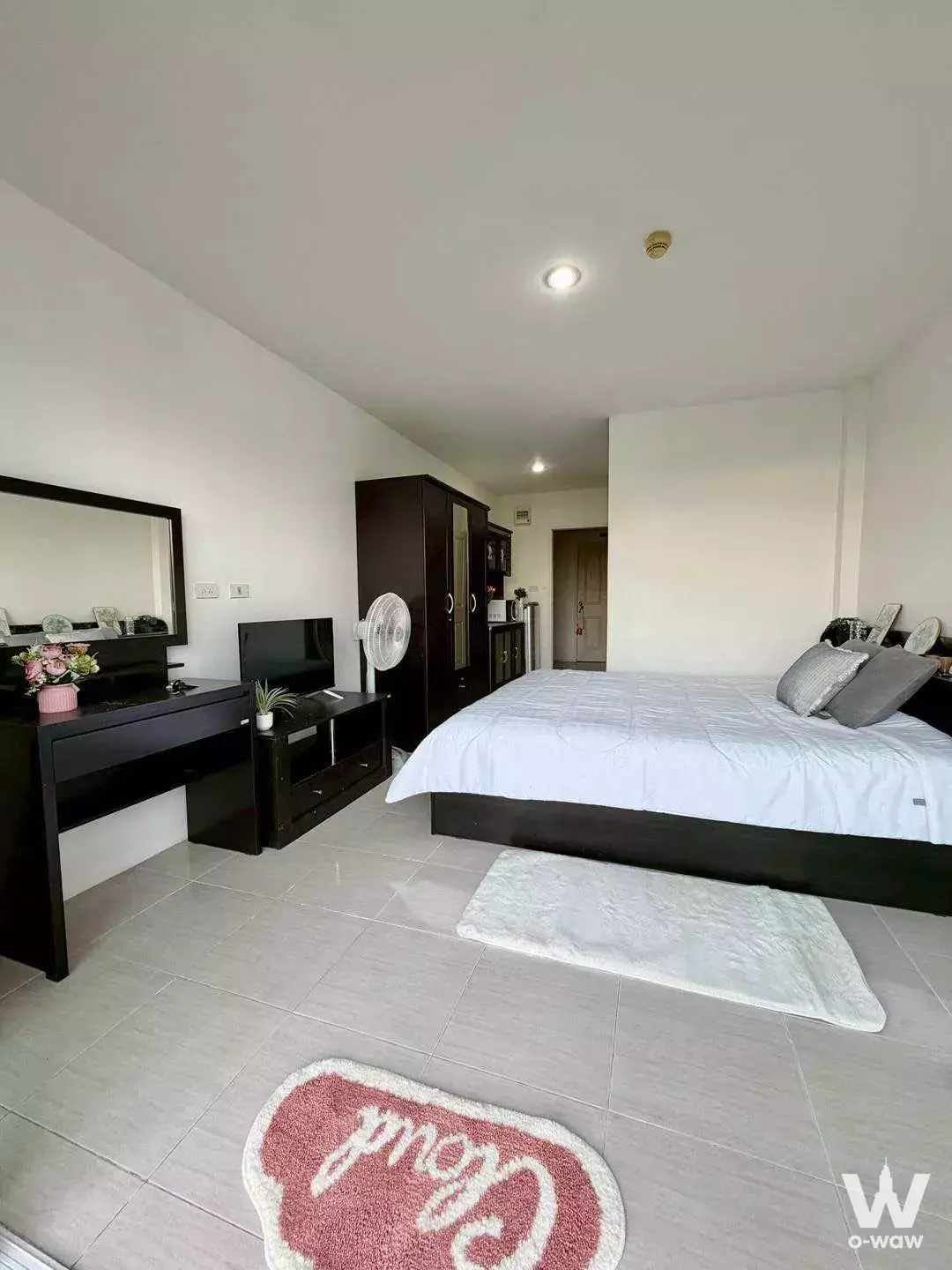 AD Bang Saray Lake and Resort bedroom with queen bed and dark wood accents