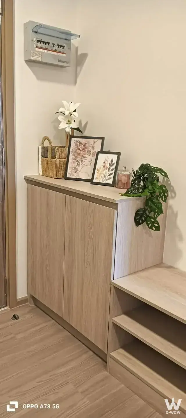 Bright entryway with light-oak flooring and built-in storage in a 1-bed condo for rent at The Base Bukit Phuket