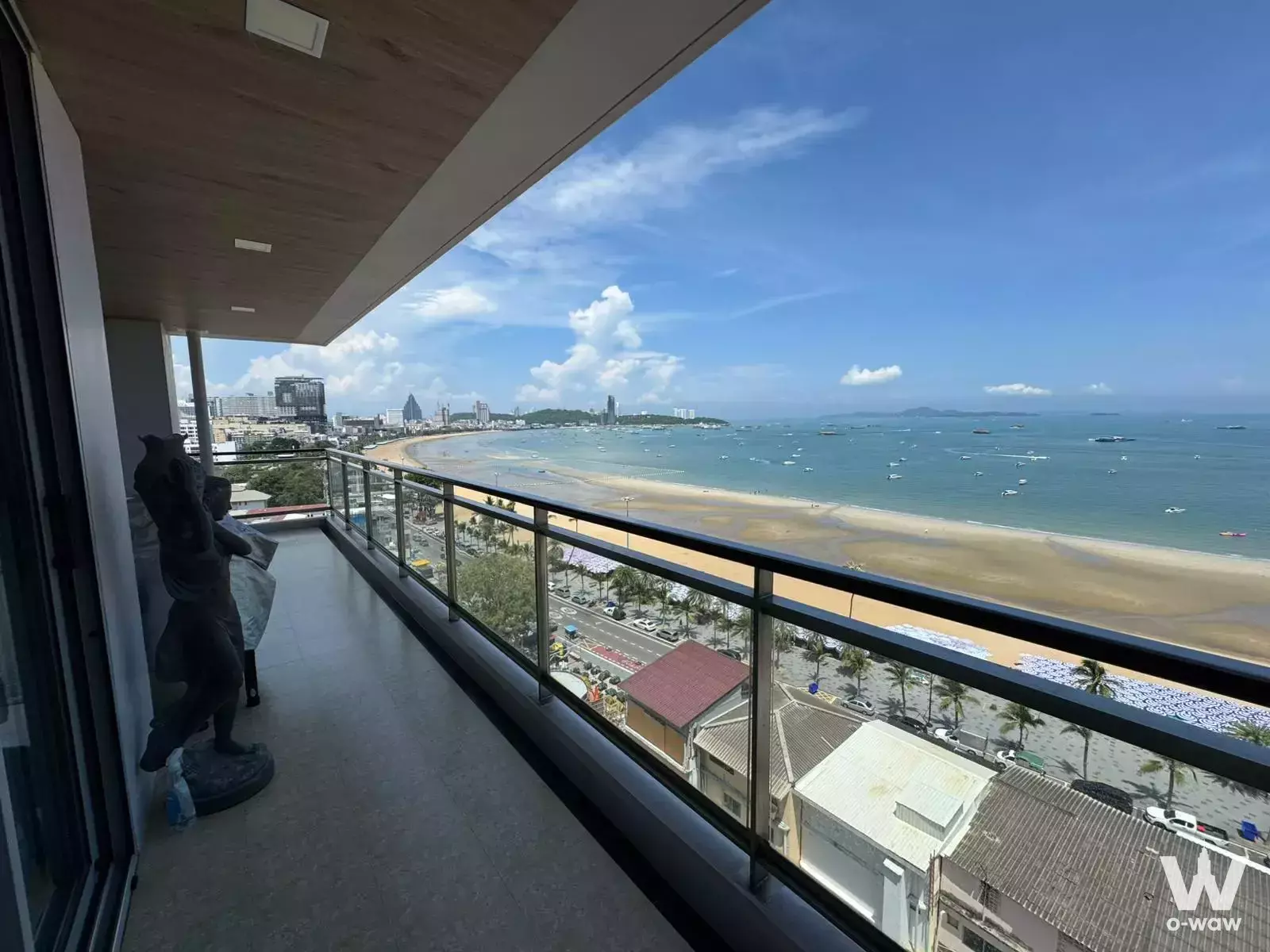Long balcony of a Northshore condo with wood ceiling and expansive ocean view