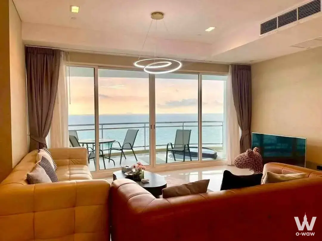 Reflection Jomtien Beach Pattaya luxury living room with sofa and sea view
