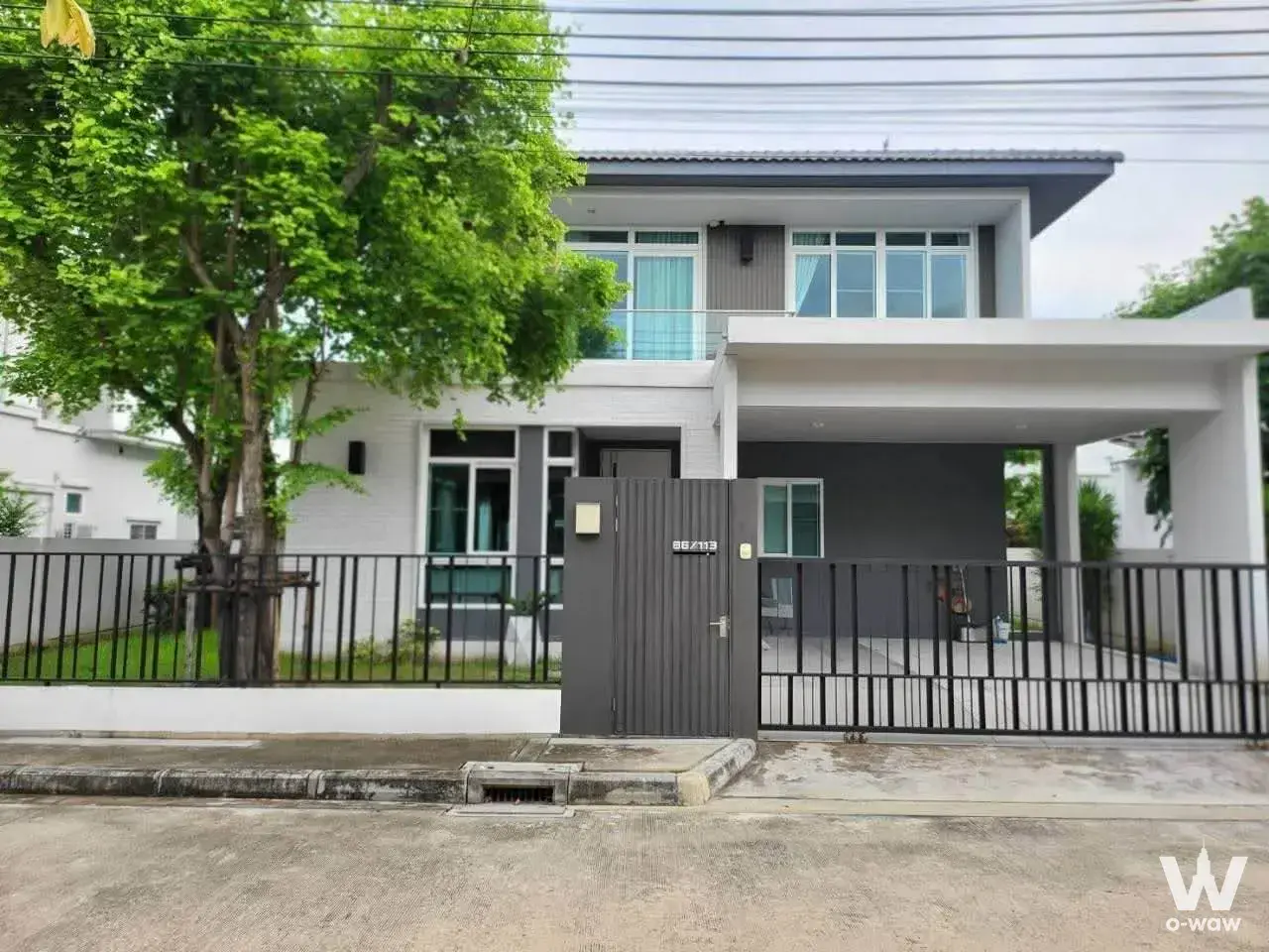 Mantana 2 Bangna two-story house exterior with white brick facade