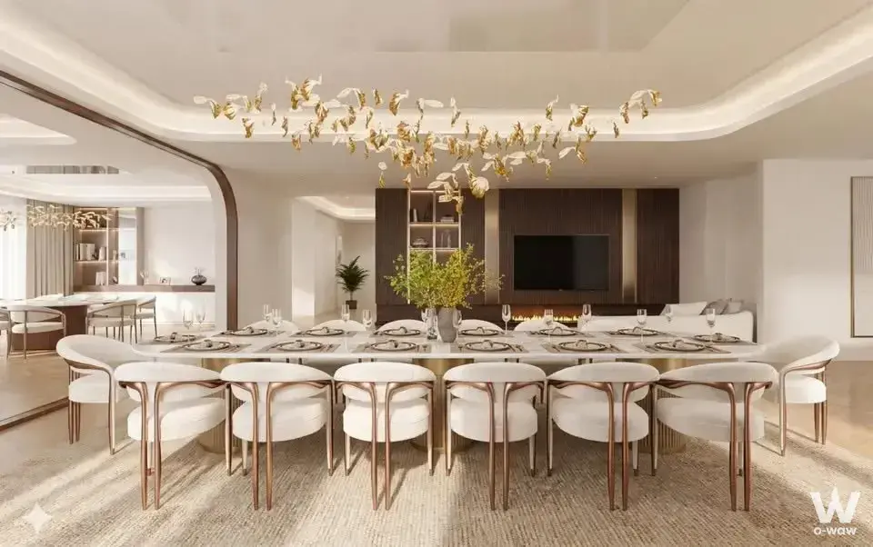 Formal dining room in a 5-bed condo for sale at ONE89 Wireless features a marble table and bird-sculpture chandelier