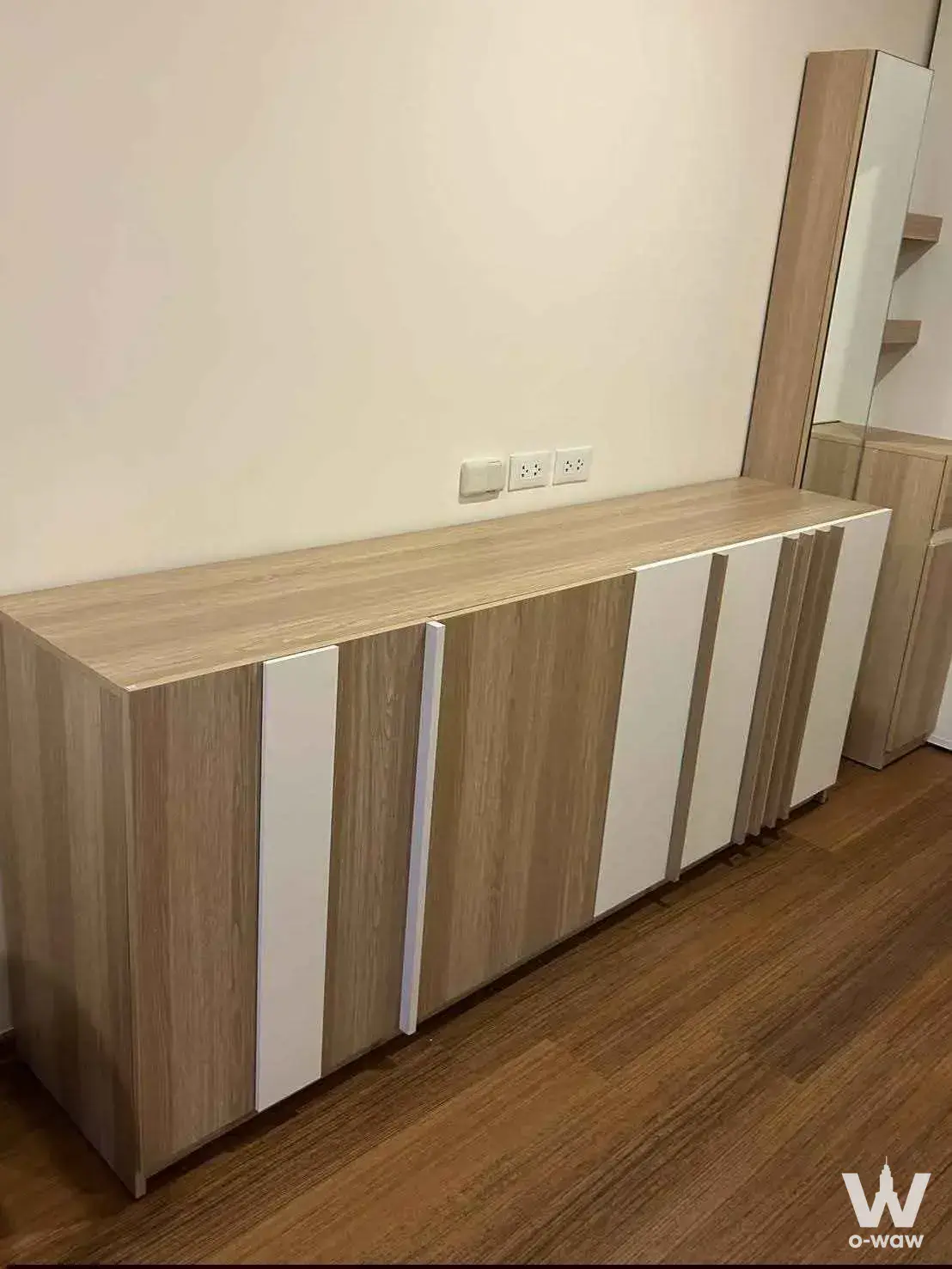 Empty 1-bed condo for rent in Lumpini Condotown Ekachai 48 featuring light-oak built-in cabinetry