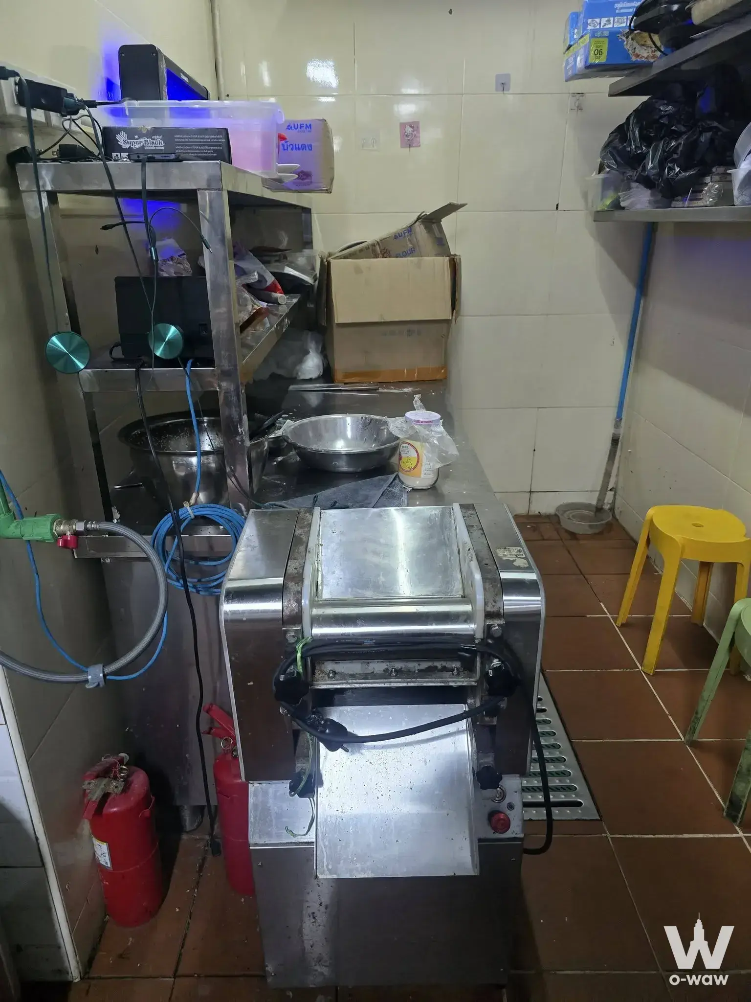 0-bed condo for sale in TC Green Building A commercial kitchen with stainless-steel prep equipment and terracotta floors