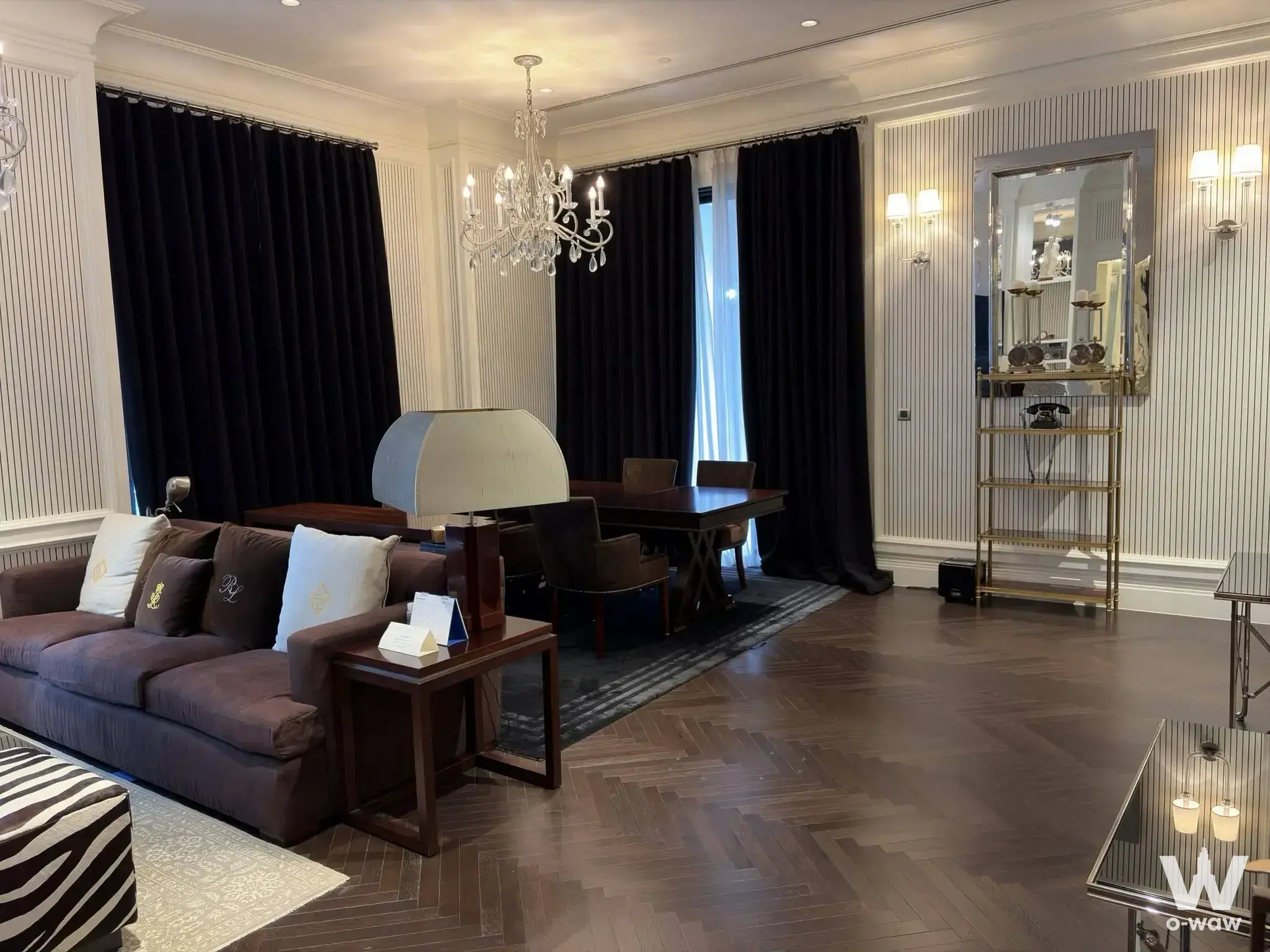 2-bed condo for sale in 98 Wireless with luxury classic style, crystal chandelier, and herringbone floors