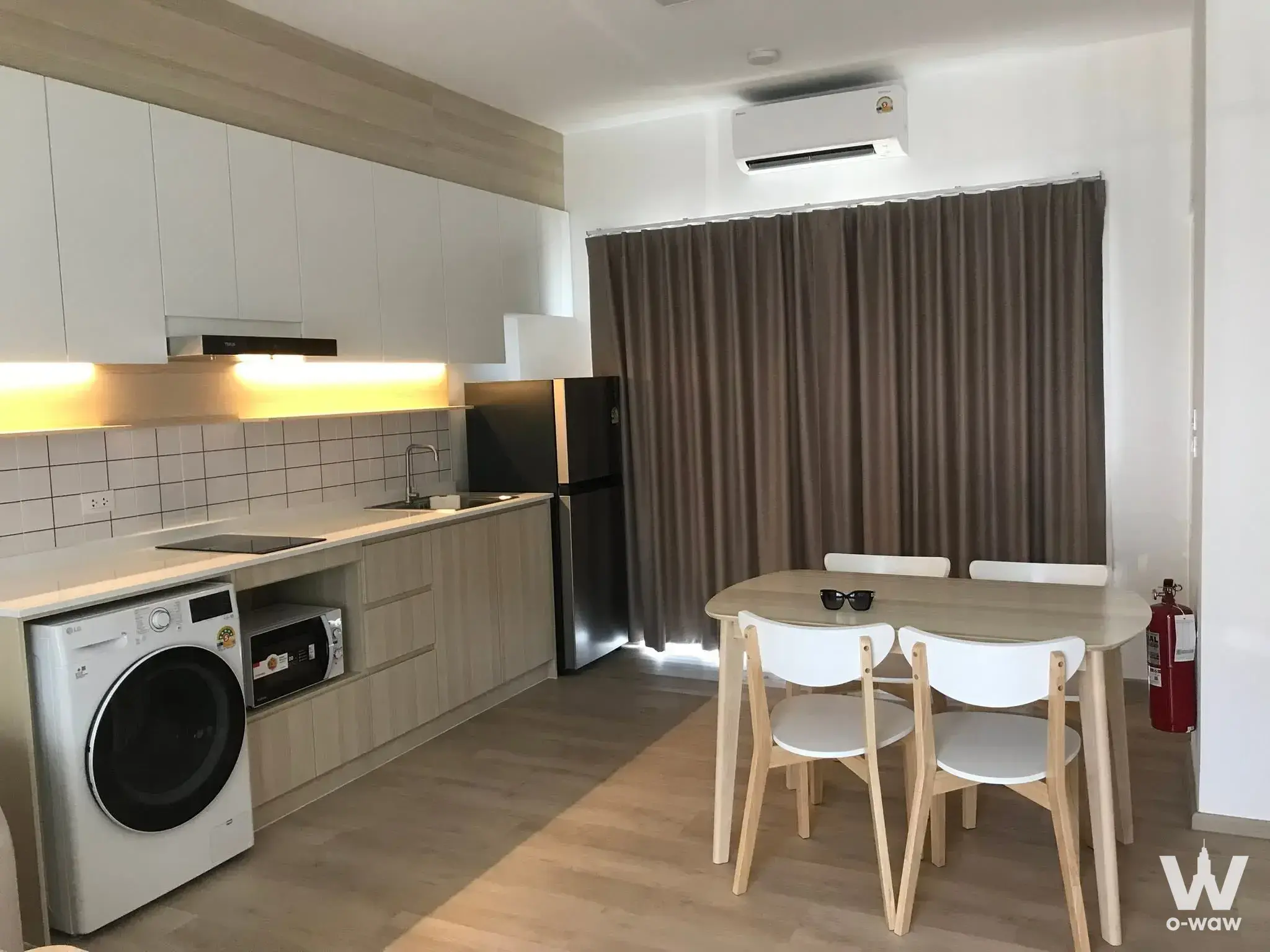 Modern 2-bed townhouse kitchen in Villaggio 2 Srinakarin-Bangna with quartz counters and light wood flooring