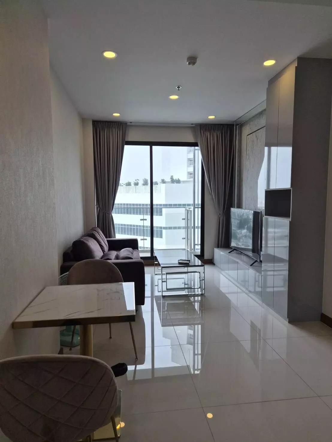 Opposite Thaksin Hospital, near ICONSIAM, accessible via Gold Line BTS