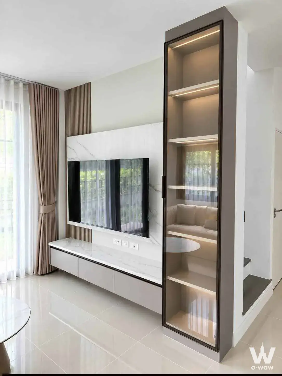 Baan Klang Muang The Edition Srinakarin-Suanluang 3-bed house living room with marble TV wall