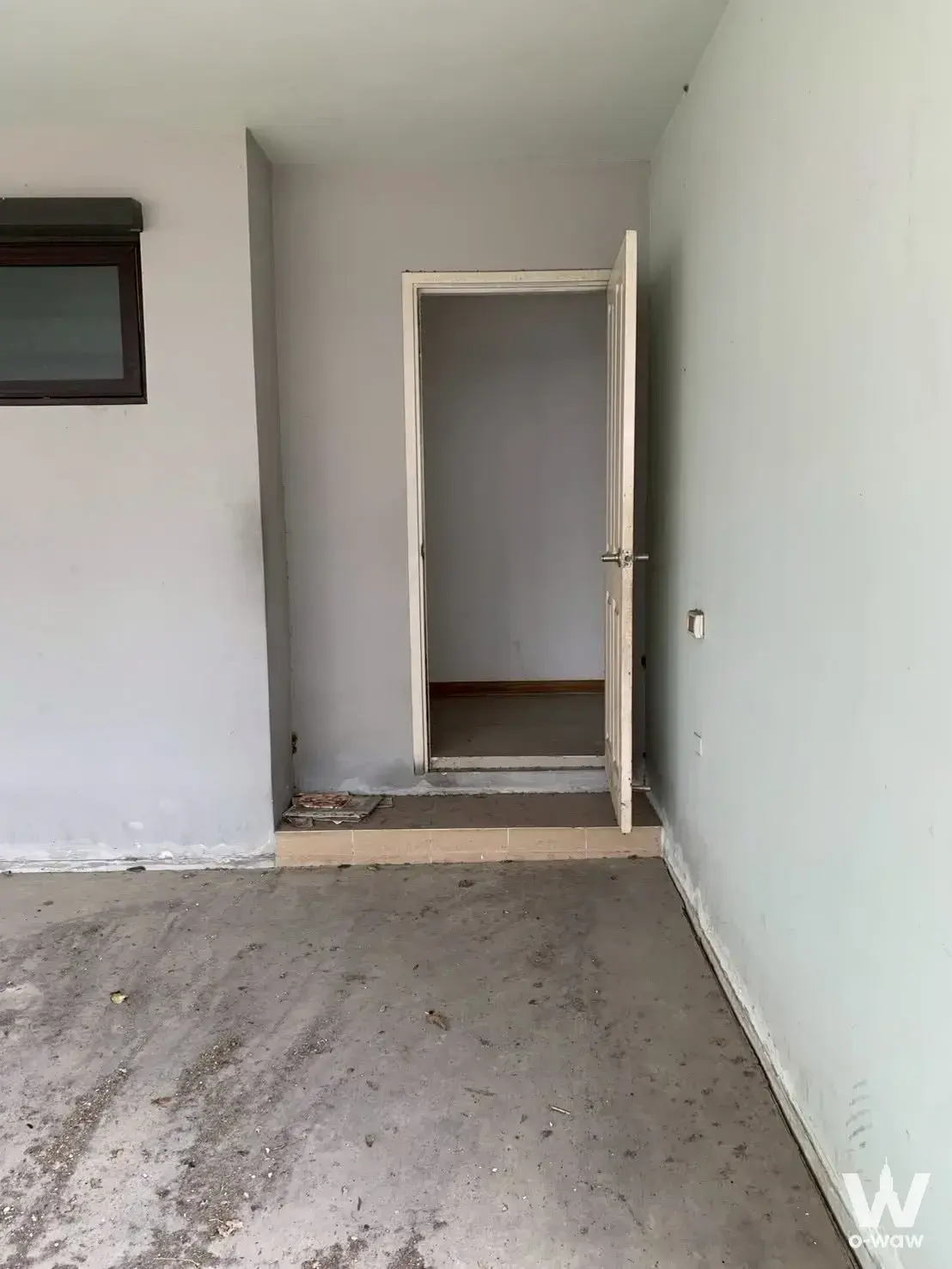 Golden Prestige Watcharapol raw concrete shell room awaiting renovation