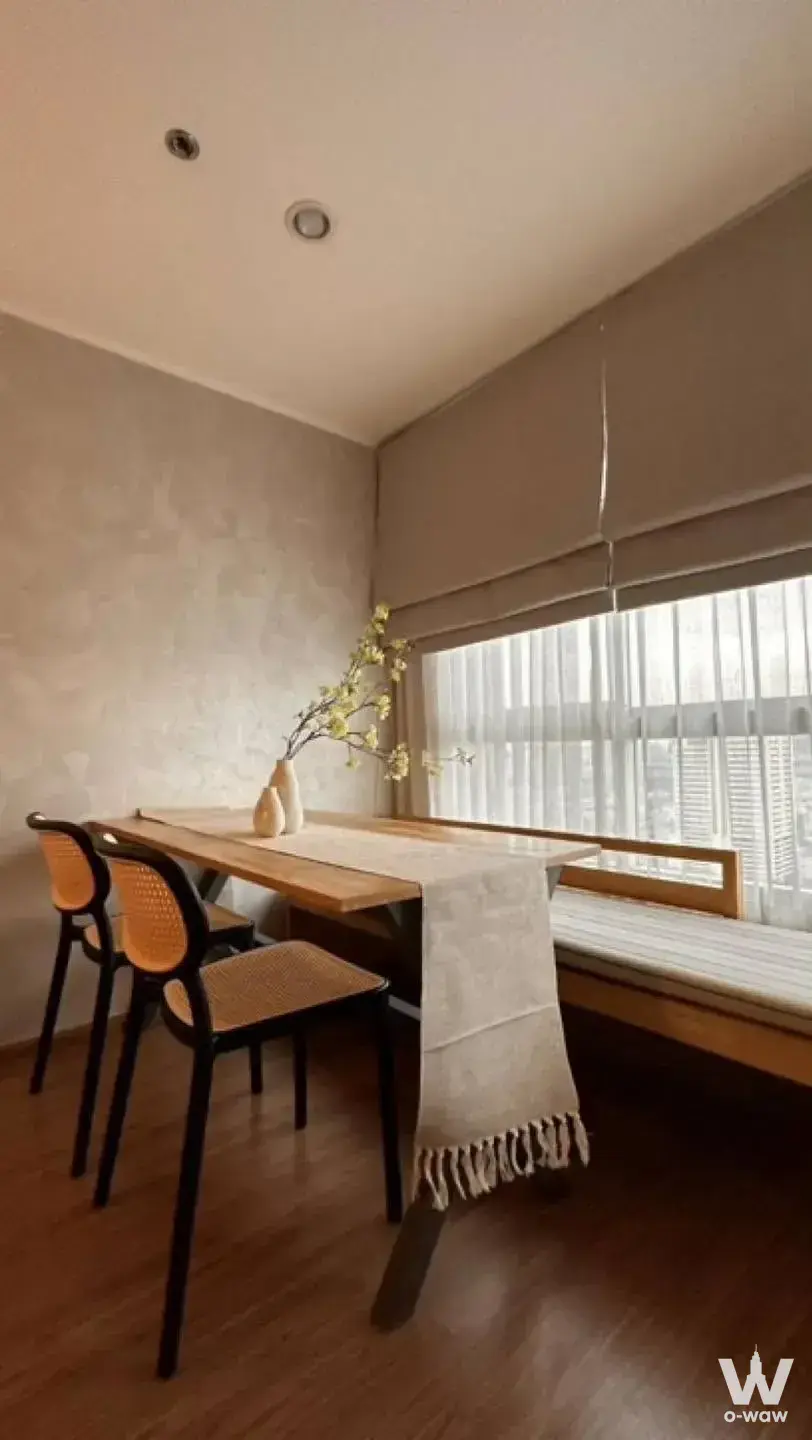 U Delight Bangson Station 2-bed condo dining nook with cane chairs and window bench