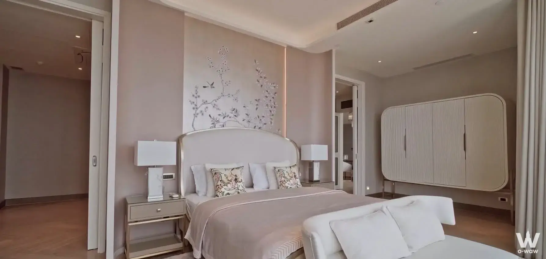 Master bedroom with botanical mural and mirrored nightstands in a 6-bed condo at Mandarin Oriental