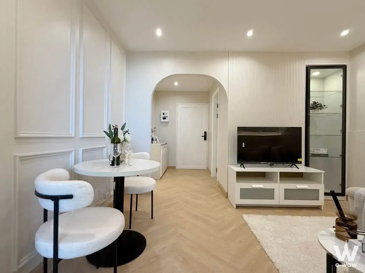 SRIVARA MANSION 1 living area featuring herringbone floors and a marble bistro table