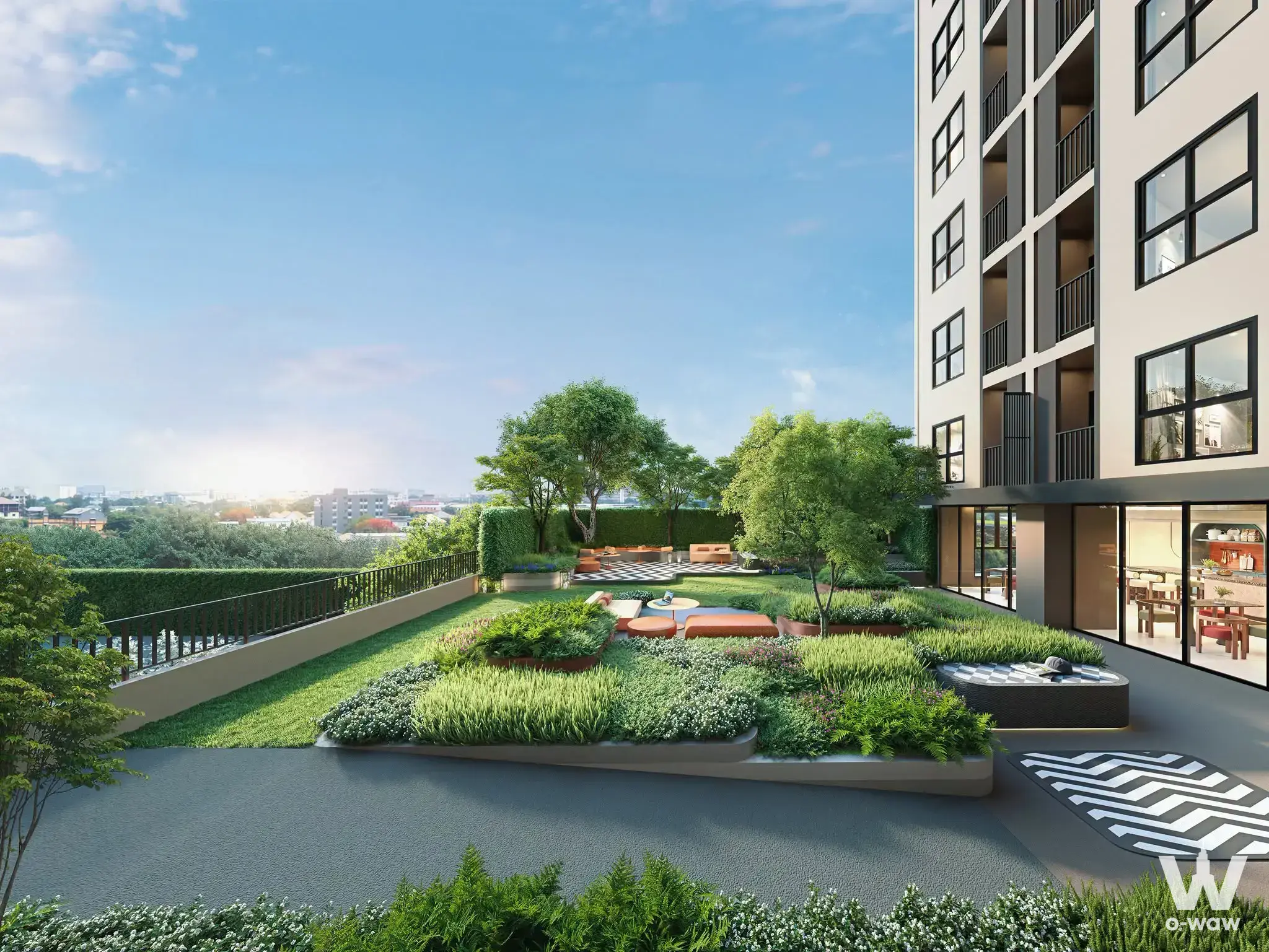 Rooftop amenity deck with lounge seating and garden views at Plum Condo East Ladprao